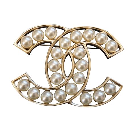 chanel brooch and pin.